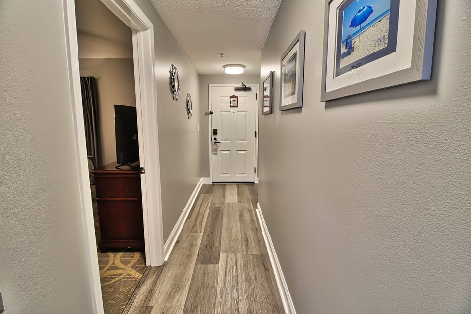 Front door and hall to the condo