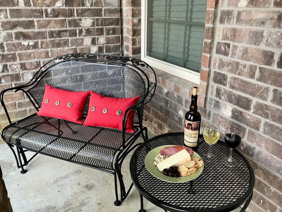 Enjoy appetizers on the porch while soaking up the beautiful weather!