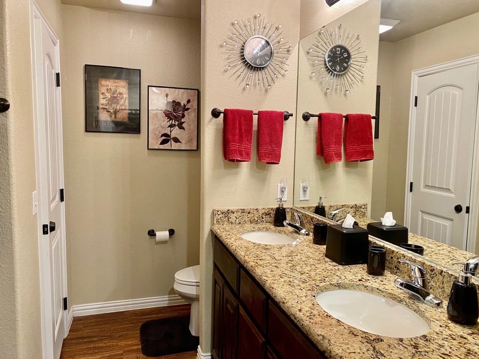 The master bathroom offers his and hers sinks!