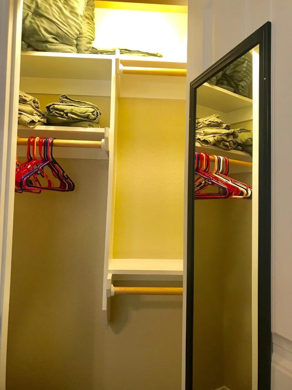 The closet in the "Western Room" has extra sheets, comforters, and hangers!