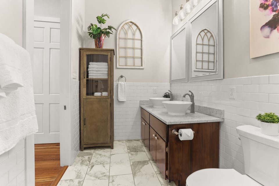 Master bathroom with rainfall shower and Jacuzzi tub and double sink vanities