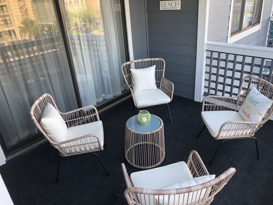 enjoy the back patio by day