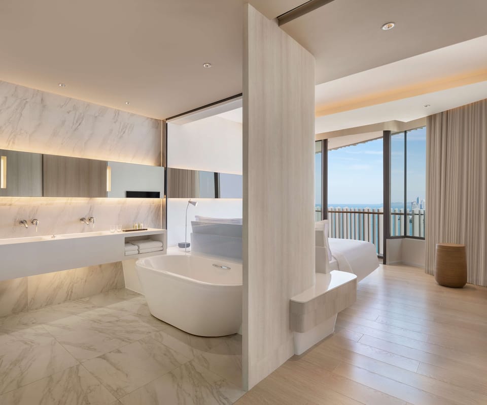 Family Suite, 1 King Bed, Ocean View (Premium) | Bathroom | Separate tub and shower, rainfall showerhead, free toiletries