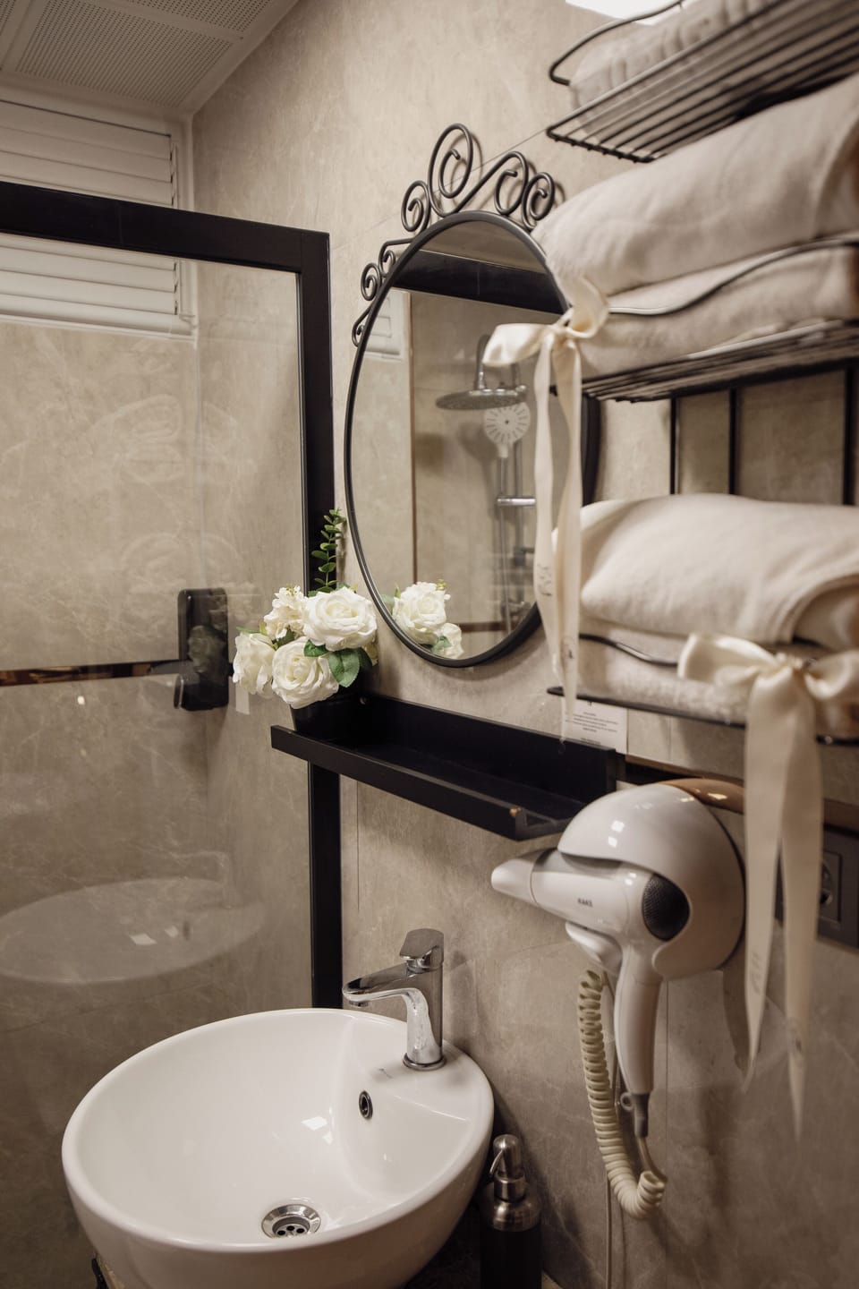 Shower, free toiletries, hair dryer, slippers