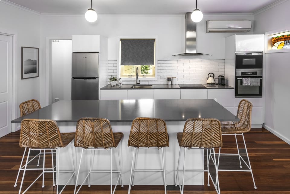 Modern kitchen with seating for six