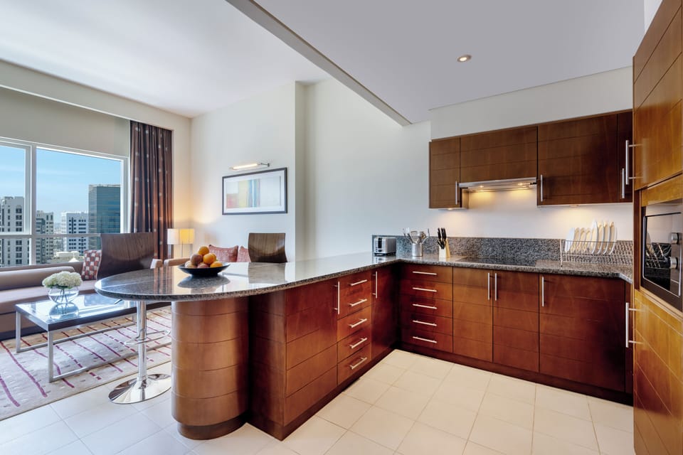 Executive One Bedroom Apartment | Private kitchen | Electric kettle, eco-friendly cleaning products