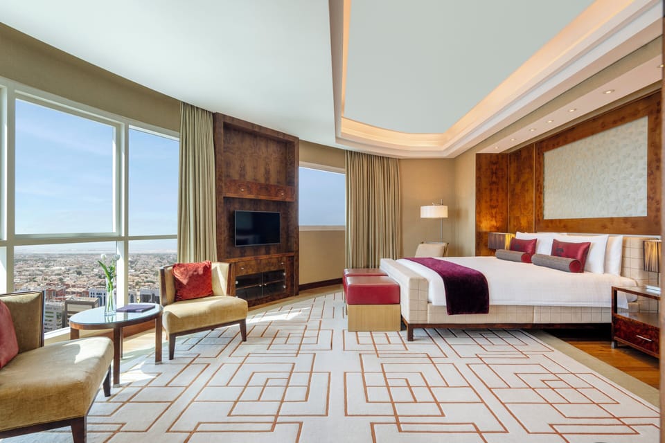 Premium bedding, down comforters, pillowtop beds, in-room safe
