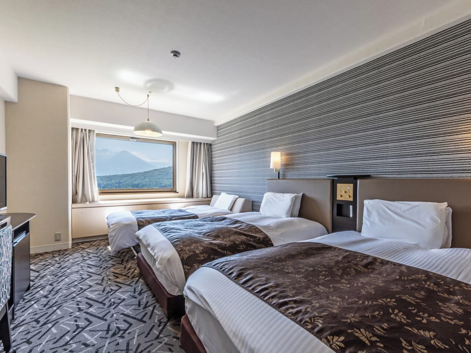 Triple Room, Non Smoking | Premium bedding, down comforters, desk, blackout drapes