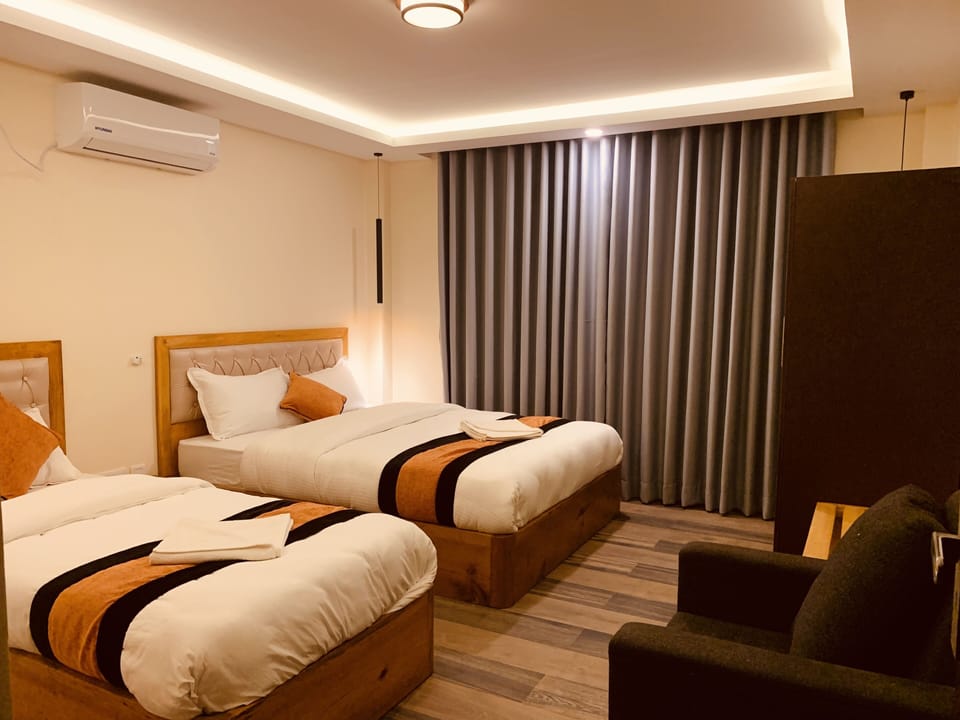 Executive Suite, 1 Bedroom, Hill View | Select Comfort beds, in-room safe, individually decorated