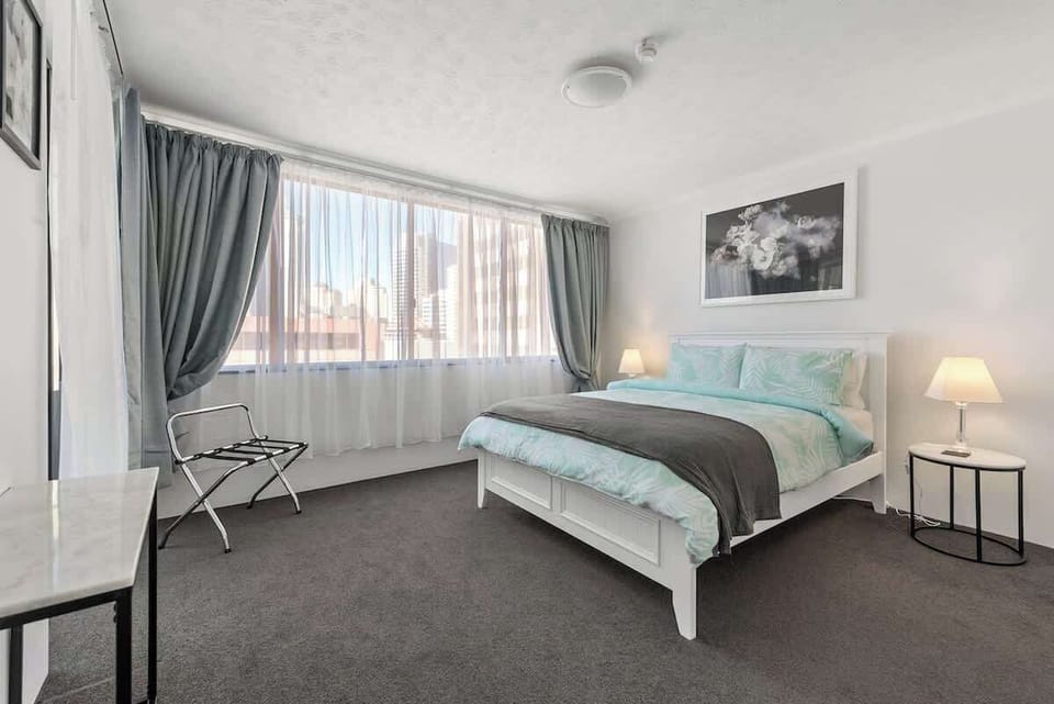 Main Bedroom - Queen bed, Ducted aircon, Black-out & Sheer curtains + Ensuite bathroom