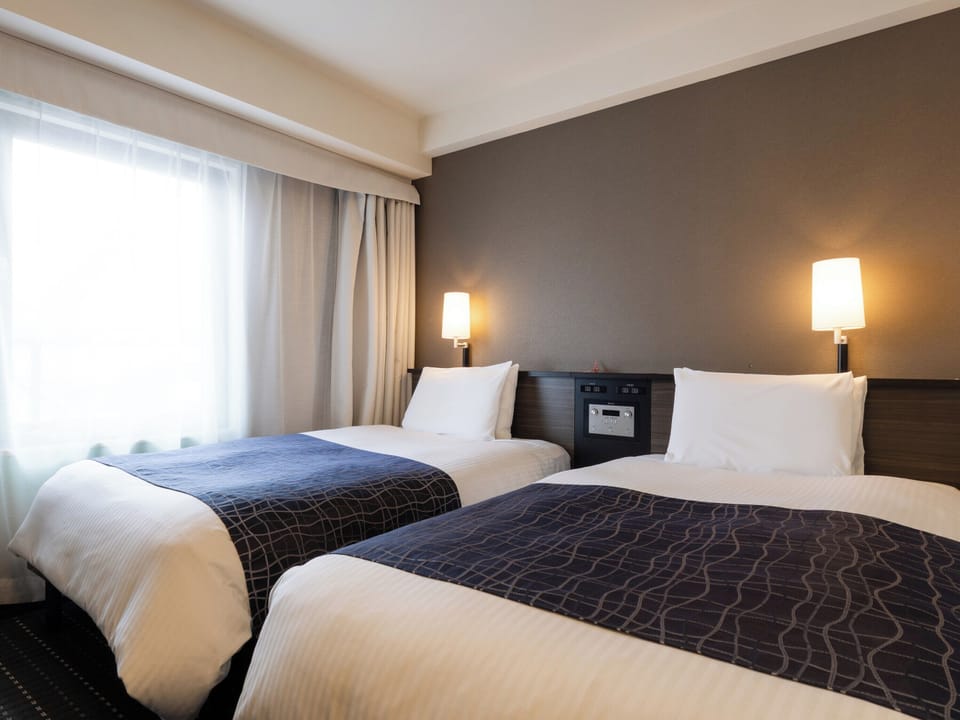 Desk, blackout drapes, WiFi (free), bed sheets