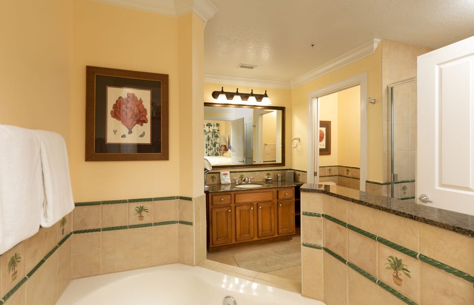 Immerse yourself in the grandeur of the ensuite bathroom in the suite