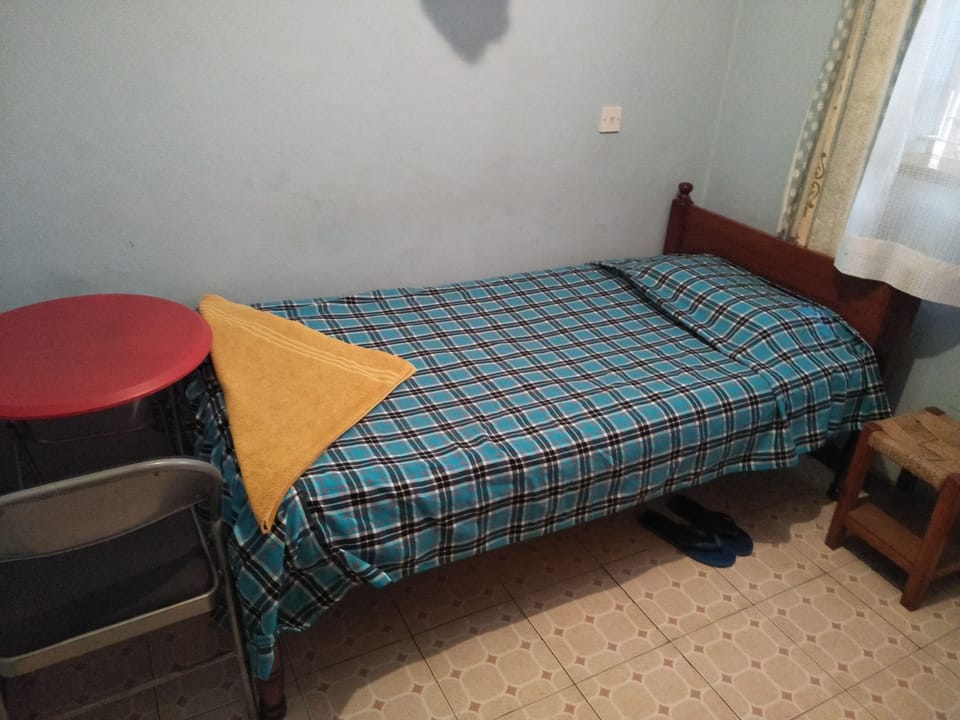 Economy Room | Iron/ironing board (on request), WiFi (free), bed sheets