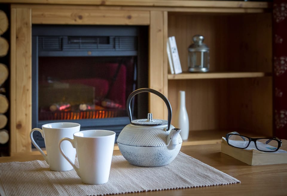 Relax by the fireplace.