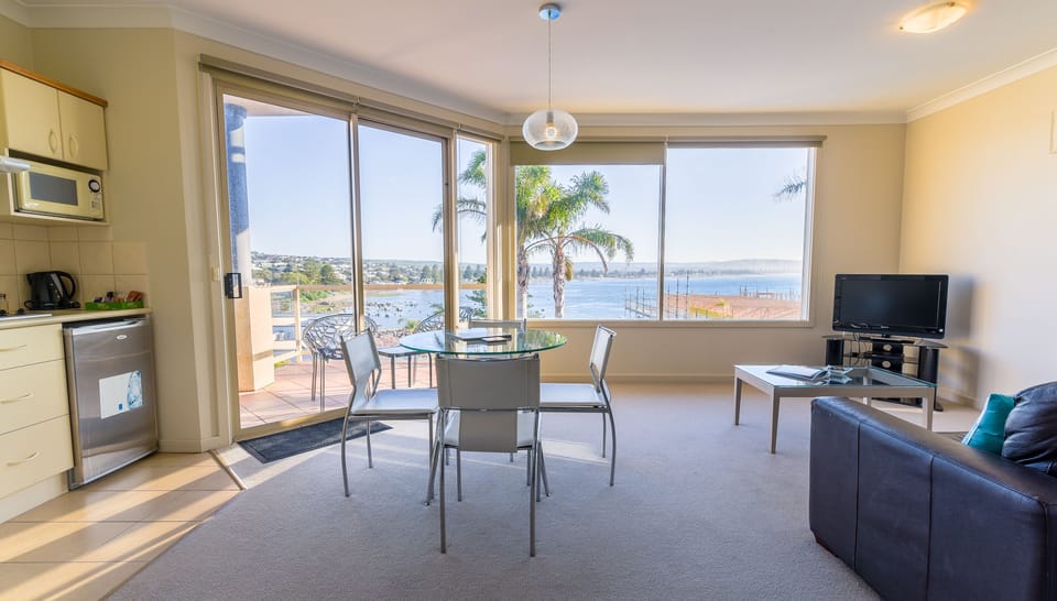 Studio, Ocean & Pool View | Living area | TV