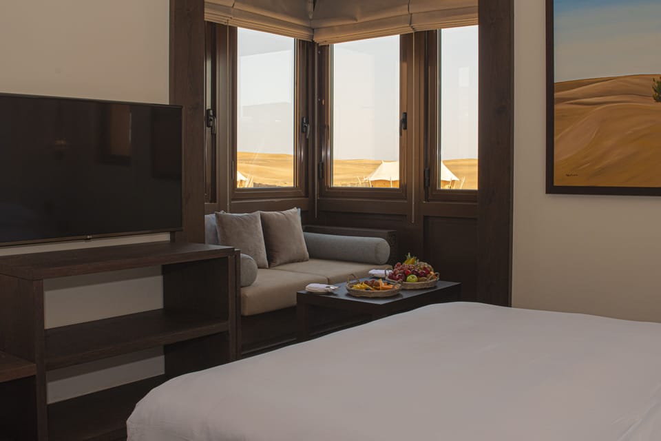 Free minibar items, in-room safe, blackout drapes, iron/ironing board