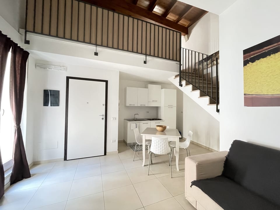 Deluxe Apartment, 2 Bedrooms | Living area | Flat-screen TV