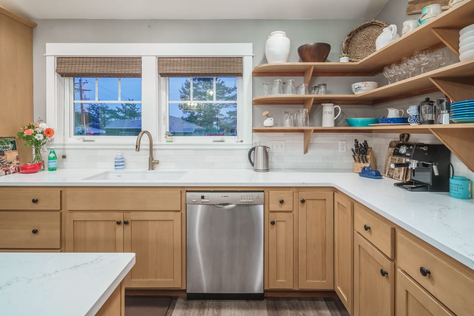 Impeccably organized and supplied kitchen awaits