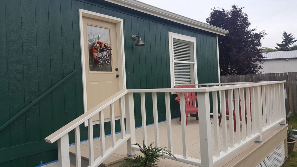 Front Porch with a couple chairs to view the neighborhood 