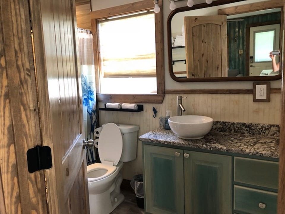 full bathroom with walk in shower