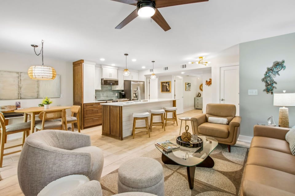 Beautifully Updated Sailmaker Villa with Open Concept Living Space with Flat Screen Smart TV and Access To Private Covered Patio