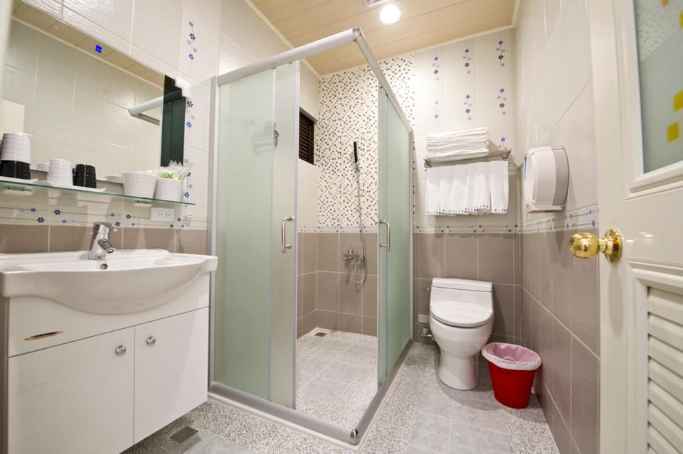 Shower, free toiletries, hair dryer, slippers