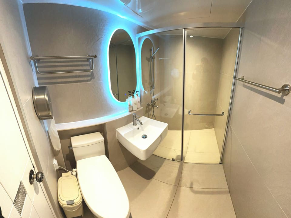 Shower, free toiletries, hair dryer, slippers