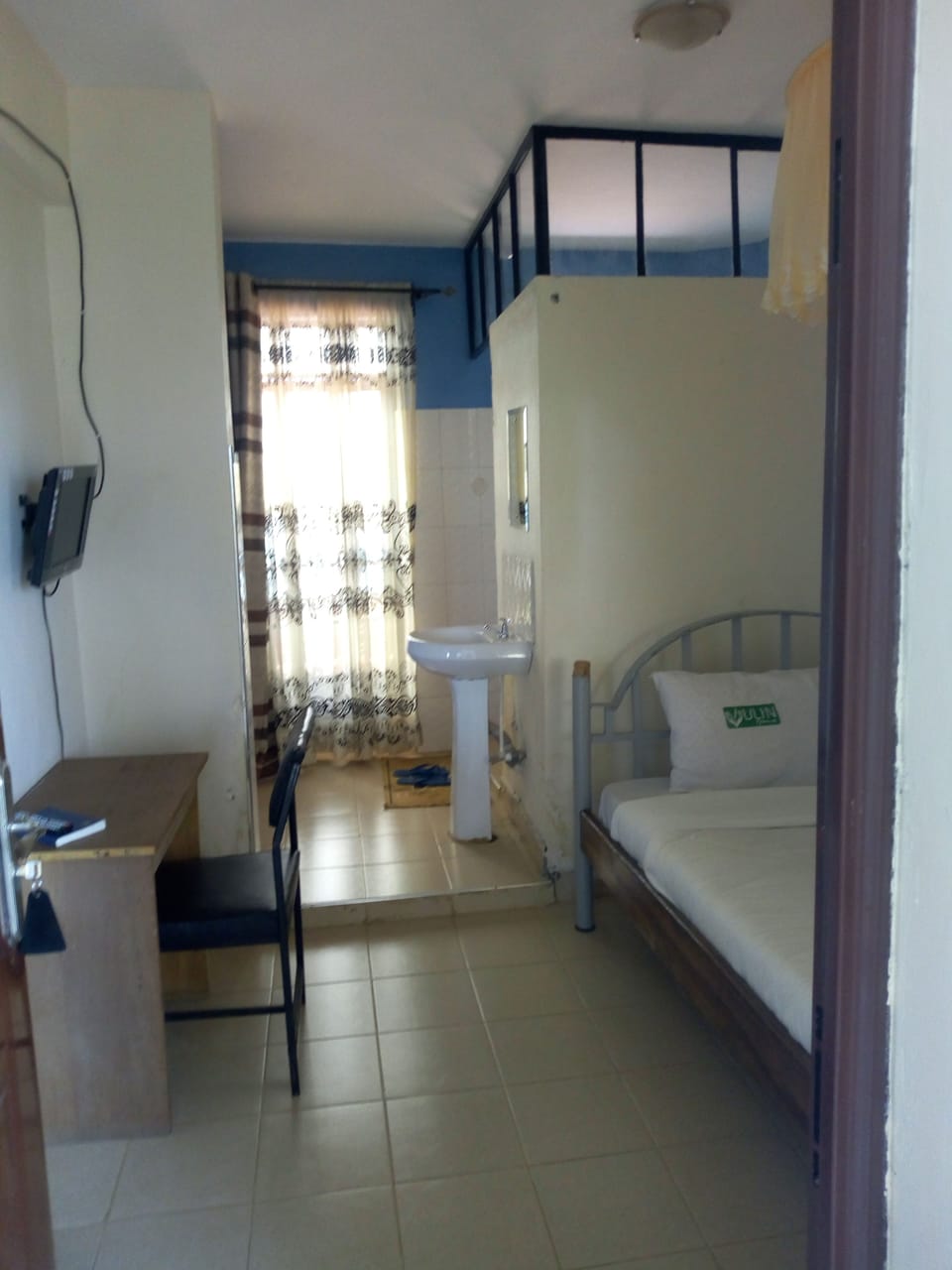 Basic Single Room | Individually furnished, desk, rollaway beds, free wired internet