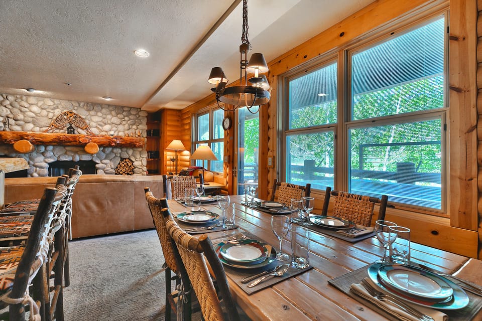 First dining room opening up to the living room with plenty of natural light