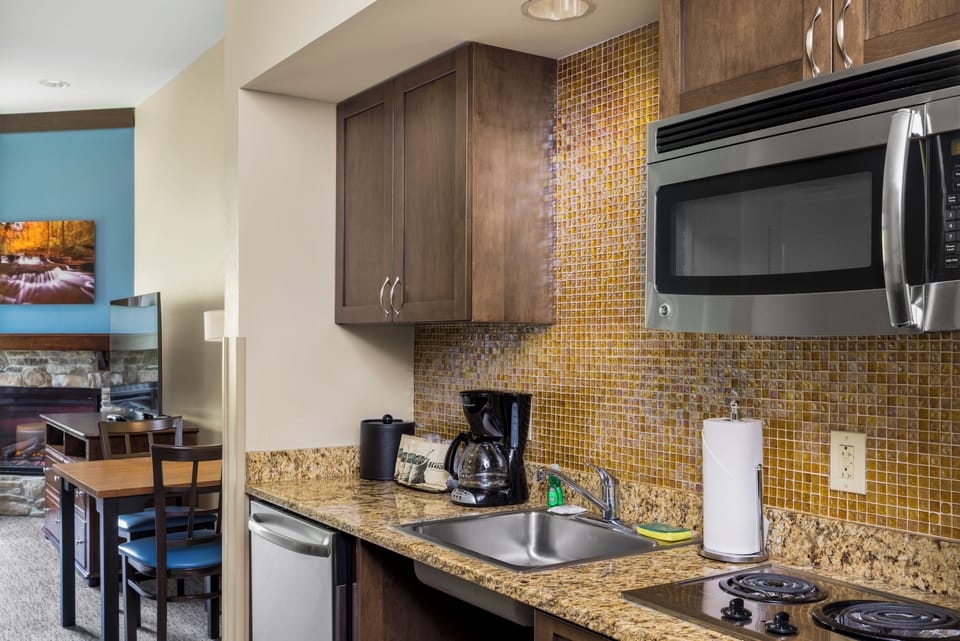 Suite, 1 King Bed with Sofa bed (King Fireplace Suite) | Private kitchen | Mini-fridge, microwave