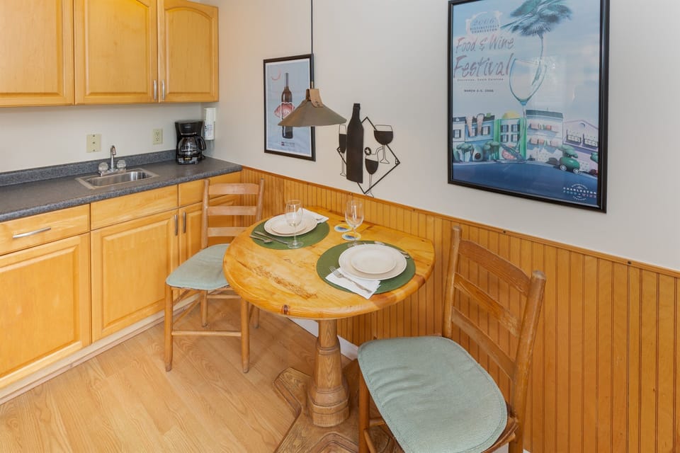 Welcome to this cozy living space where you can relax, watch TV and plan your day at the beach.