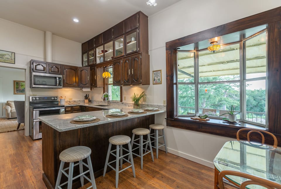 Bar seating for four in the kitchen.