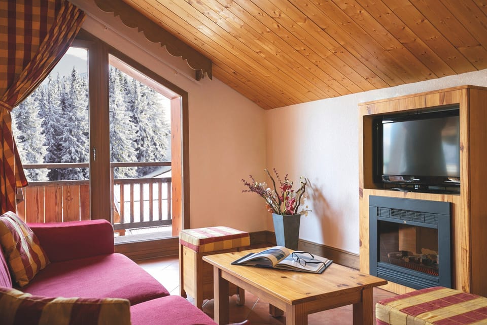 Sink into the cozy sofa after a day exploring the area.