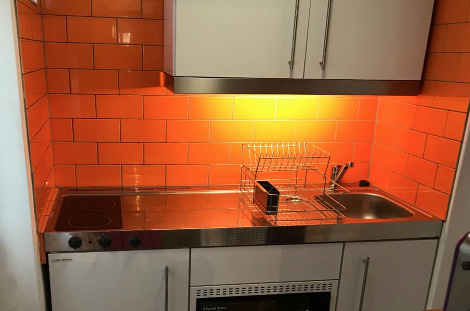 Worktop with integrated hotplate and sink.