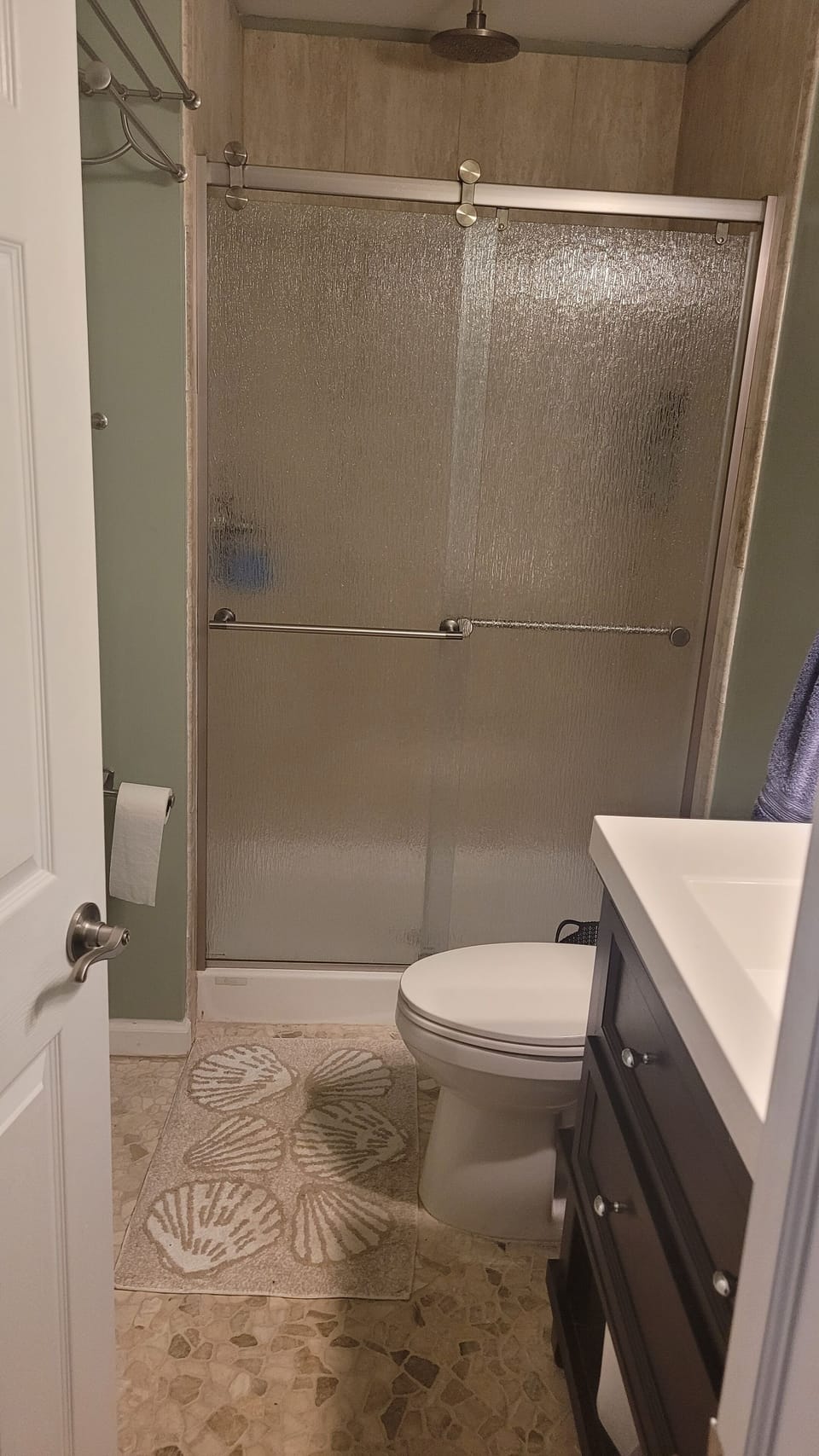 Upstairs bathroom with overhead shower.