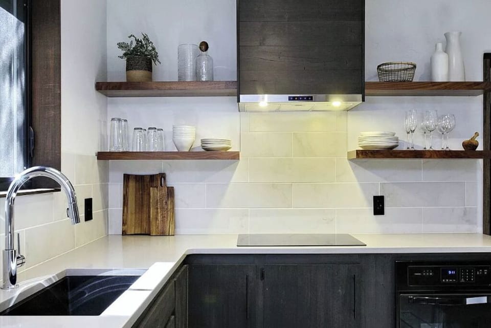 Modern, open concept kitchen with everything you need to dine in.