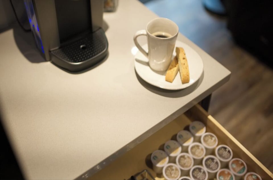 Drink up and enjoy. A drip coffee maker and grinder are also available.