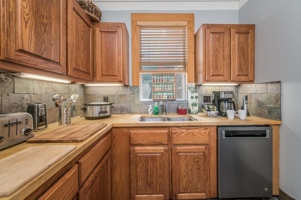 Our kitchen is fully stocked with dishes, pots and pans and all appliances