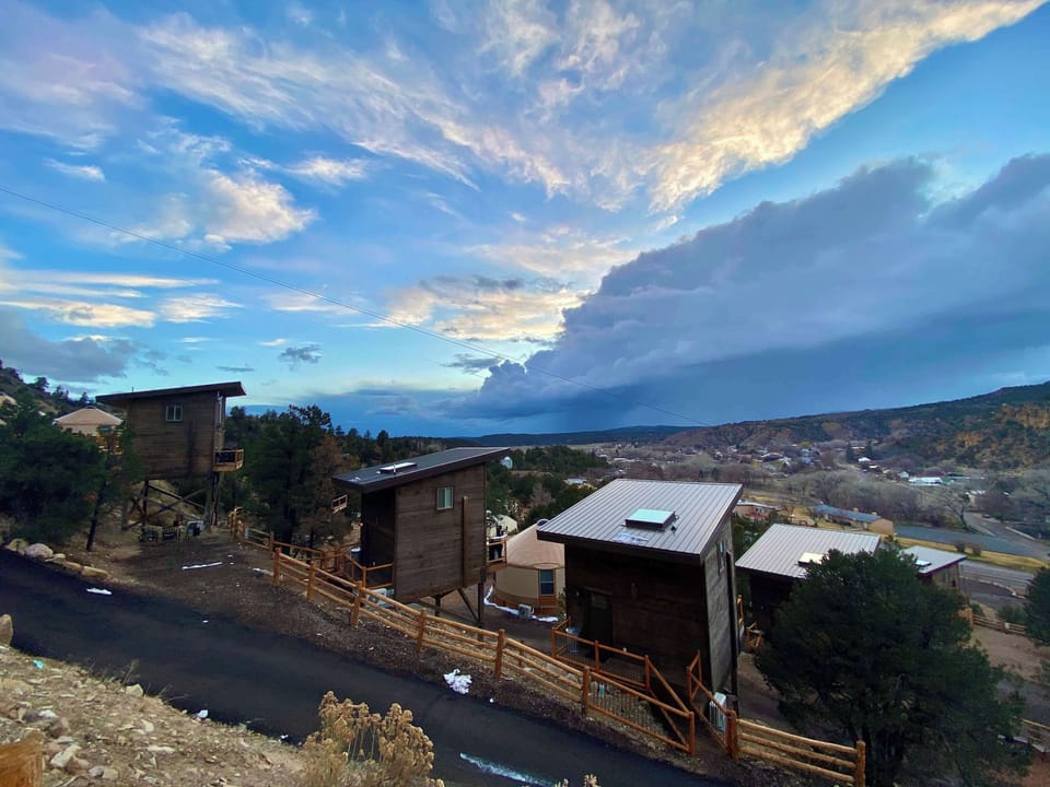 Treetop cabin views surrounded by peaceful Southern Utah scenery, creating a cozy and unique stay at East Zion Resort.