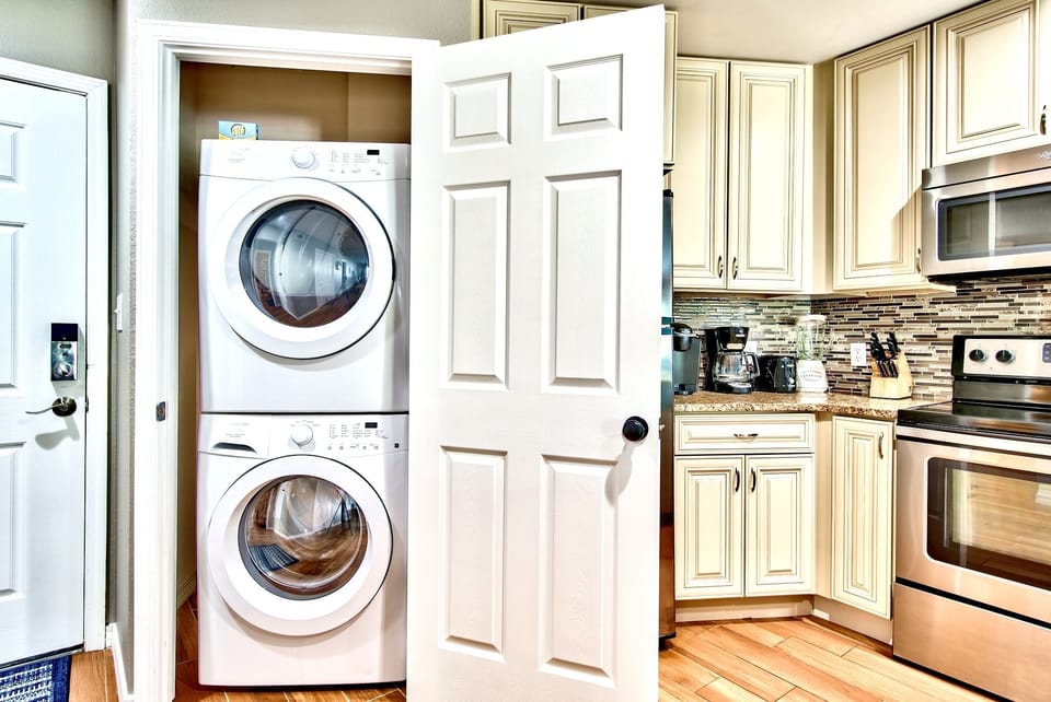 Full-sized washer and dryer - near entry of  condo.
