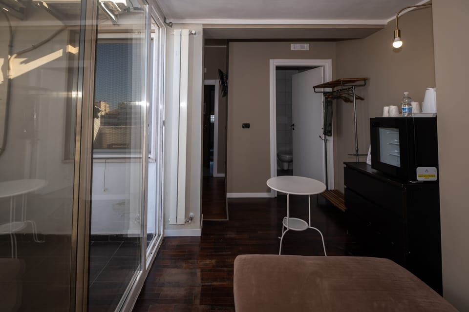 Triple Room, Balcony (4) | Living area | 32-inch flat-screen TV with cable channels, TV