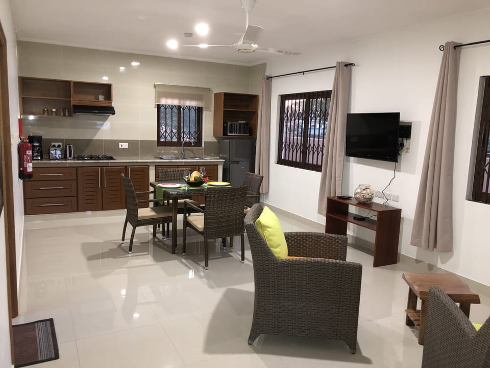 Apartment, 1 Bedroom, Garden View | Living area | Flat-screen TV