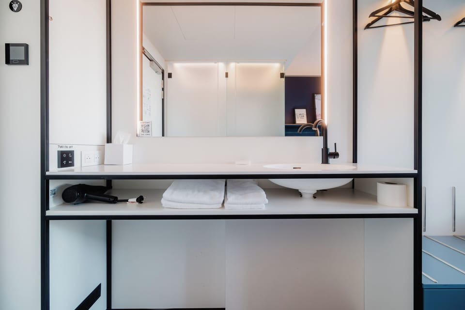 Shower, rainfall showerhead, eco-friendly toiletries, hair dryer