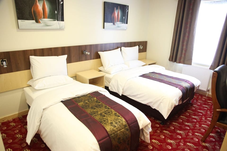 In-room safe, desk, iron/ironing board, free cribs/infant beds