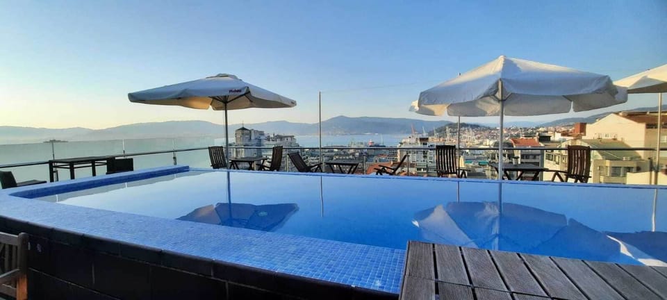 Seasonal outdoor pool, sun loungers