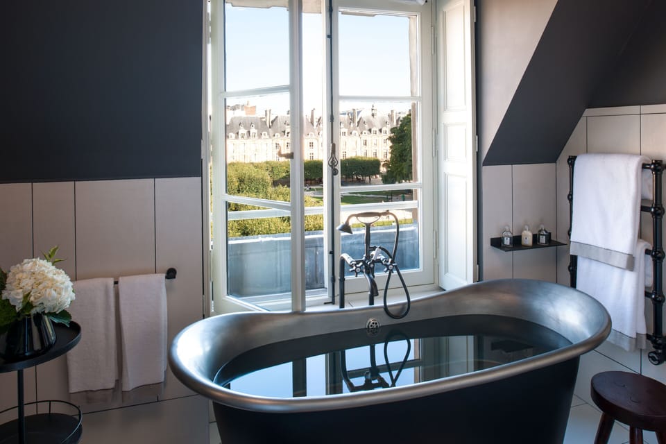 Designer toiletries, hair dryer, bathrobes, slippers