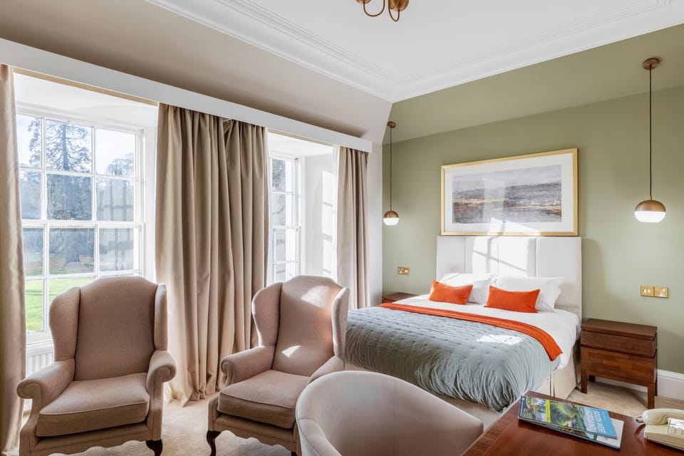 Deluxe Family Room | Individually decorated, individually furnished, desk, iron/ironing board