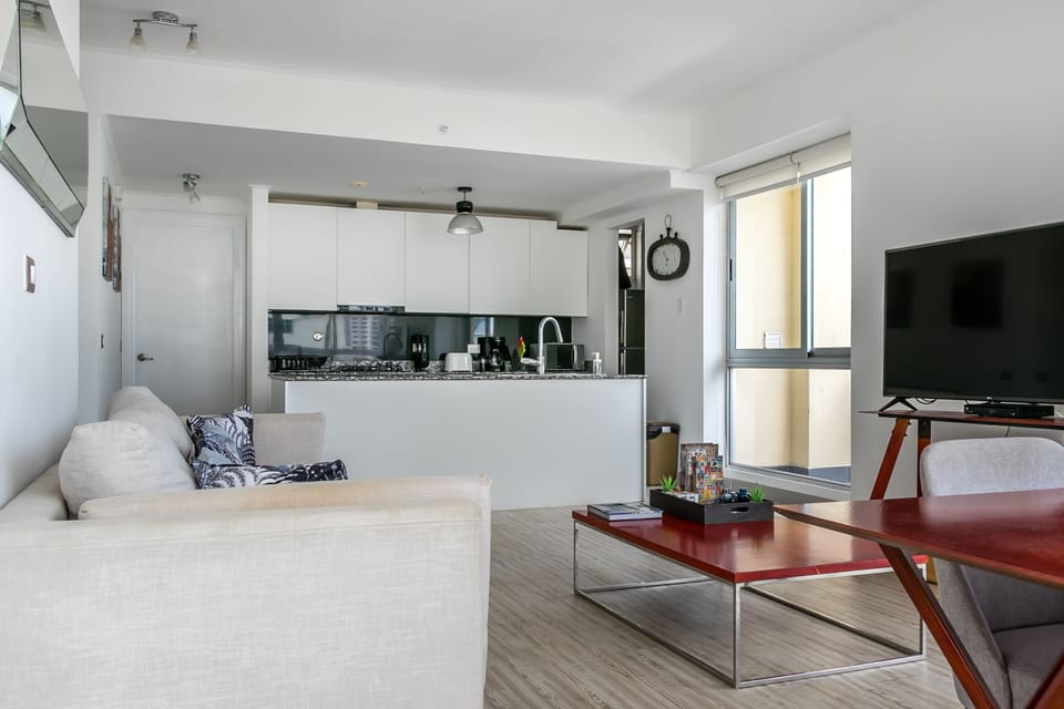 Deluxe Apartment, 2 Bedrooms | Living area | 55-inch Smart TV with cable channels, TV