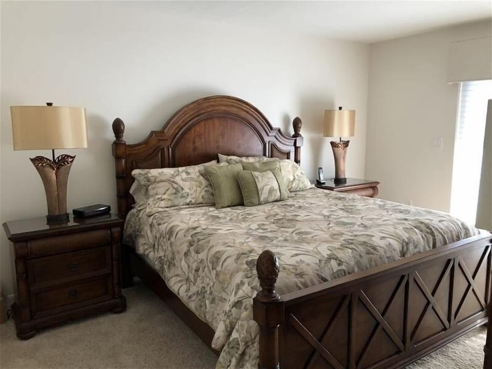 Master bedroom with king and balcony