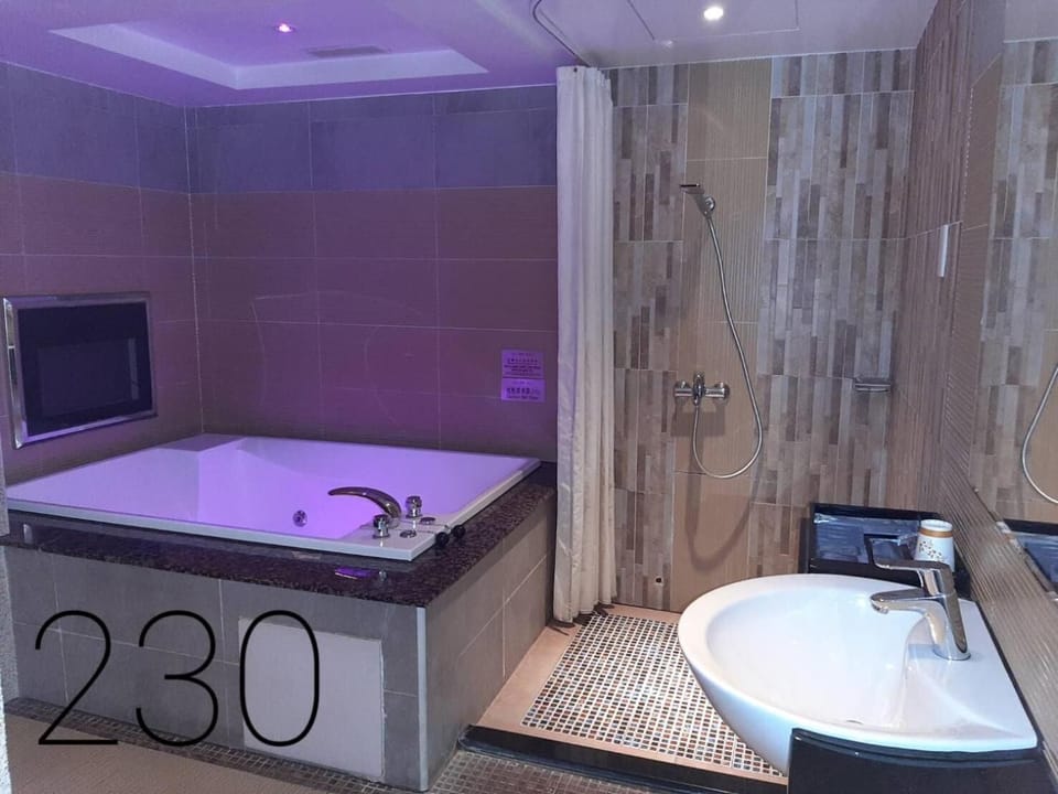 Separate tub and shower, free toiletries, hair dryer, slippers